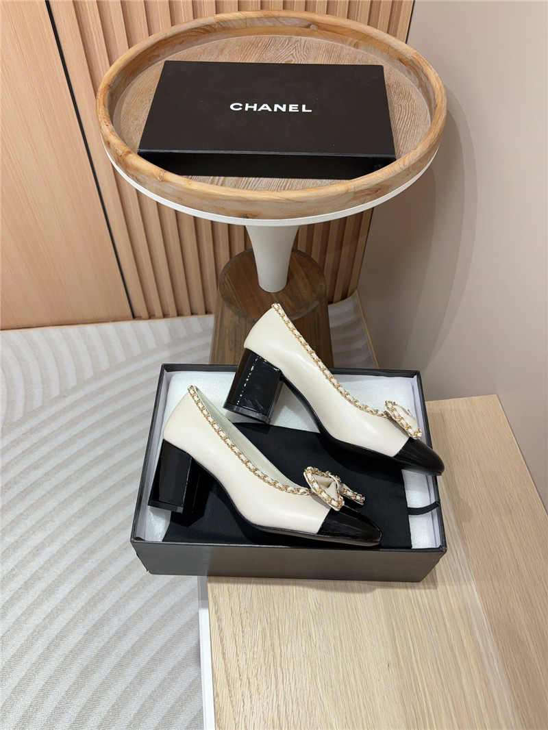 Ch**el bow chain trim ballet pumps in white and black leather