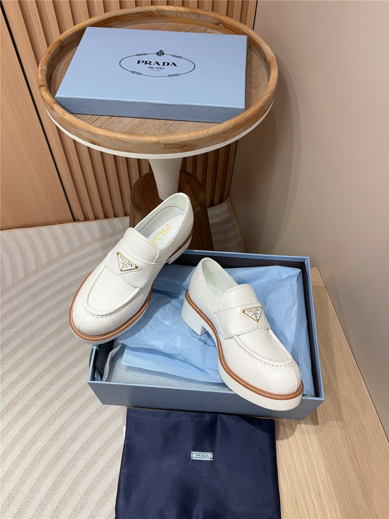 Pra*a white double chocolate leather loafers