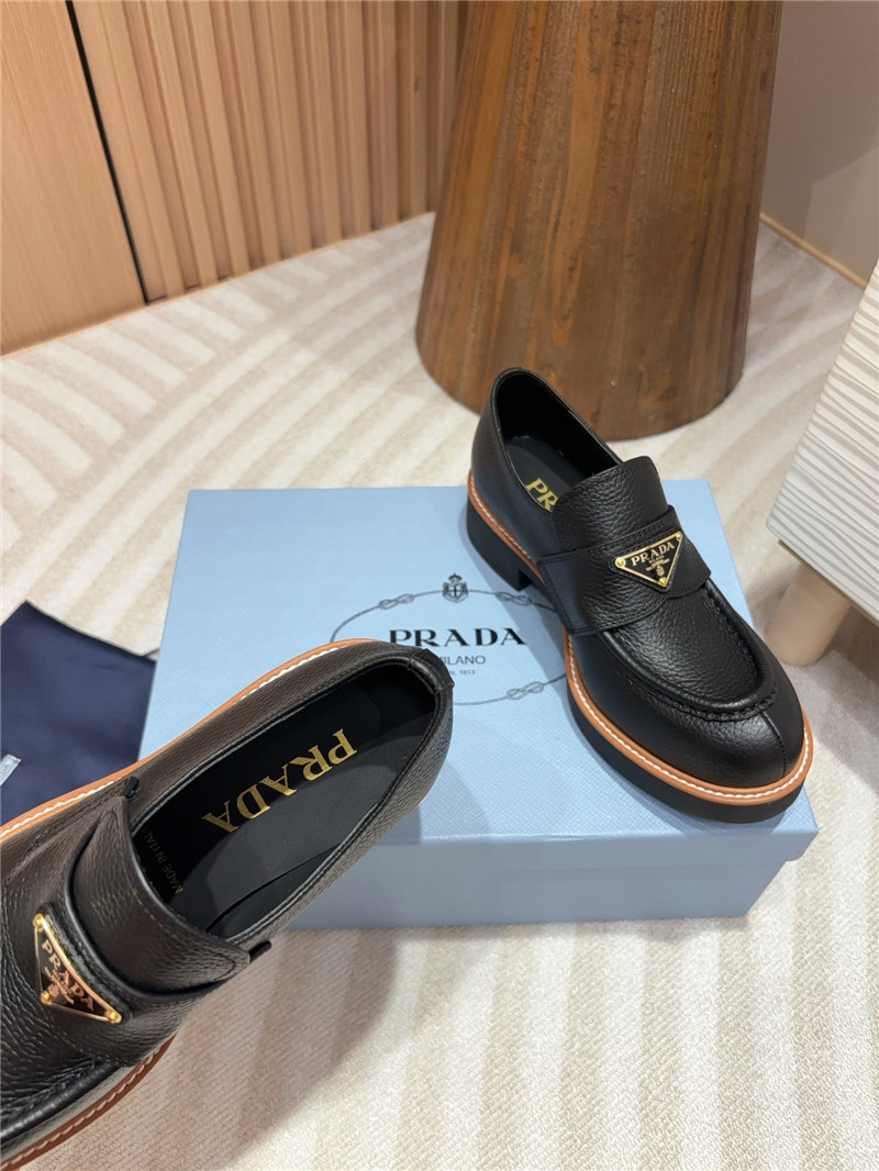 Pra*a black double chocolate leather loafers