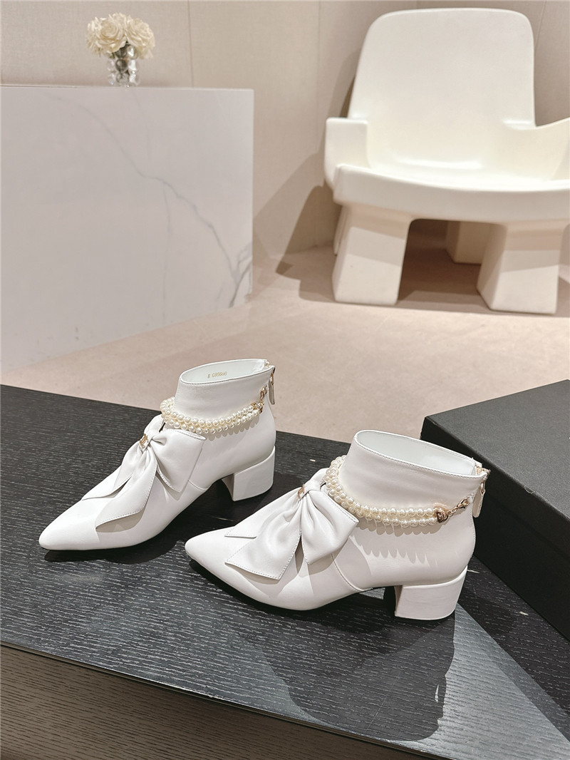 Ch**el white pointed toe bow pearl ankle boots
