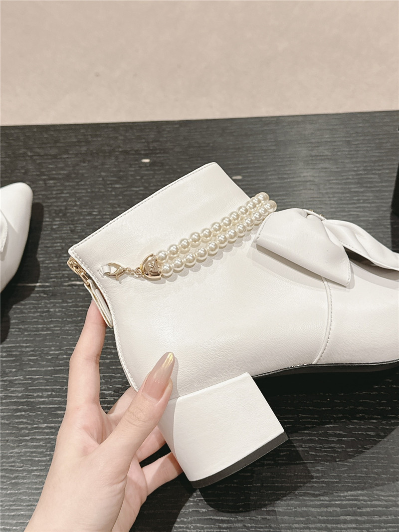 Ch**el white pointed toe bow pearl ankle boots
