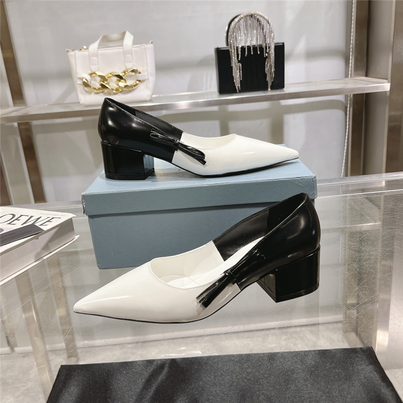 Pra*a chunky pointed pumps in black and white calfskin