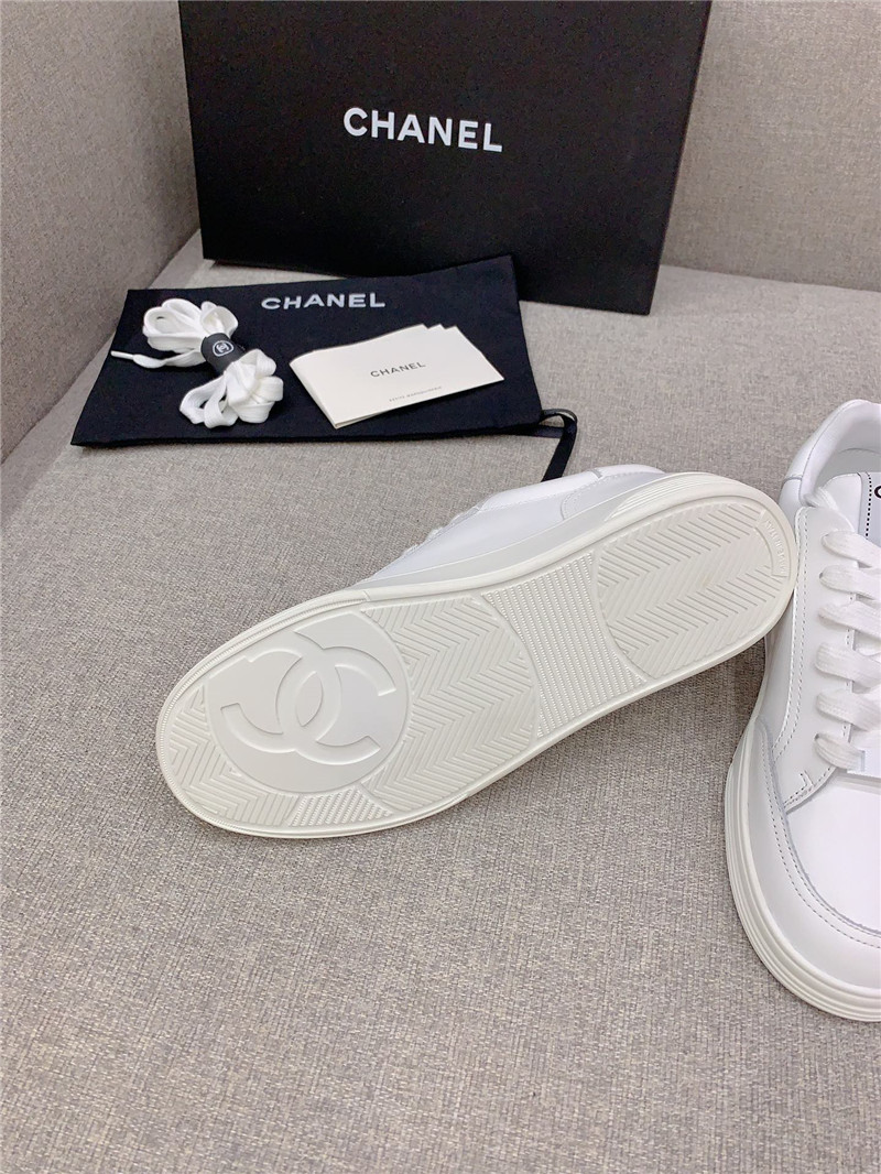Ch**el white lace-up trainers