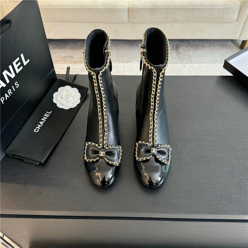 Ch**el black calfskin bow patent leather ankle boots