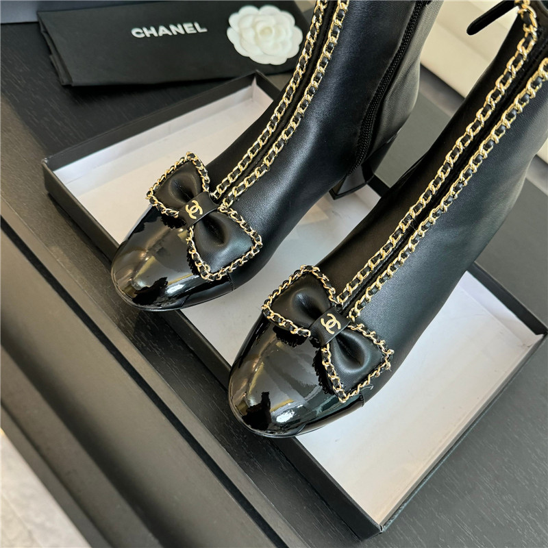 Ch**el black calfskin bow patent leather ankle boots