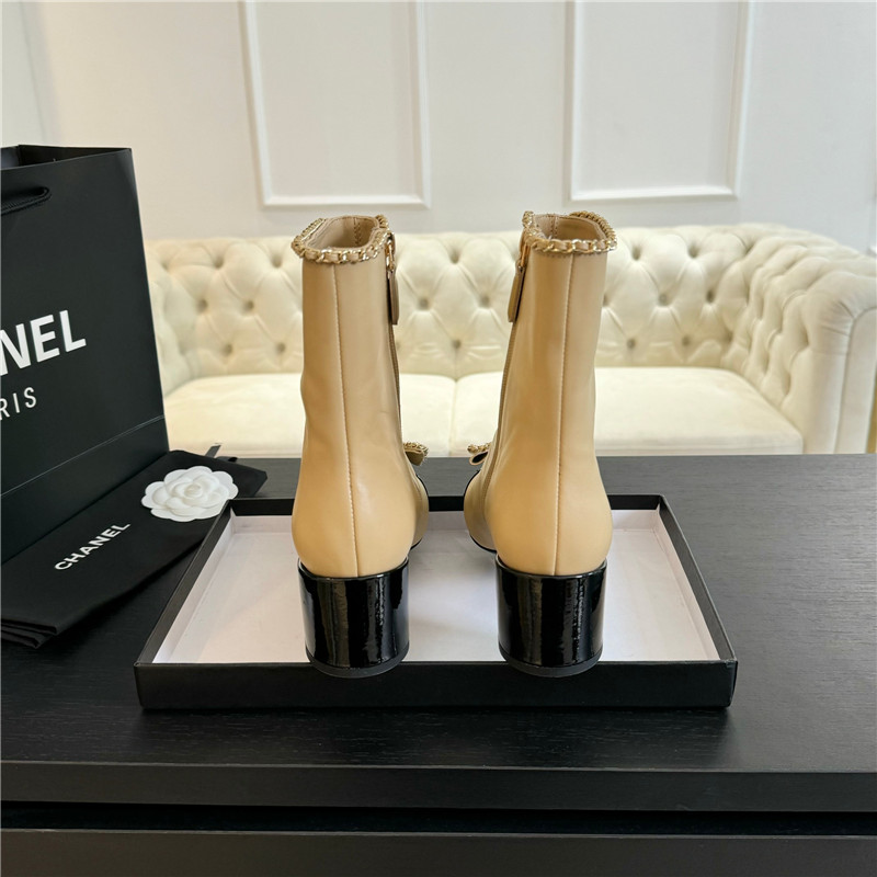 Ch**el calfskin bow patent leather ankle boots