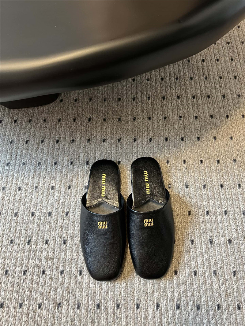 Miu Miu Black Leather Slippers with Embossed Logo