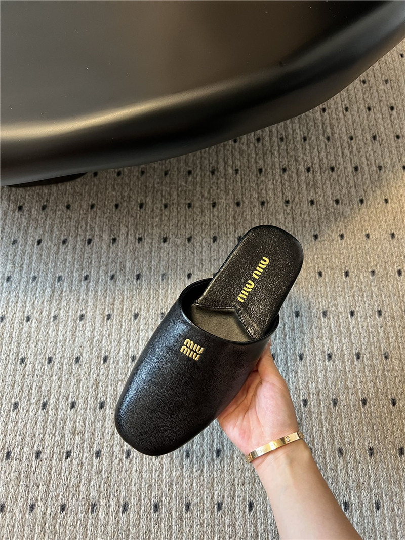 Miu Miu Black Leather Slippers with Embossed Logo