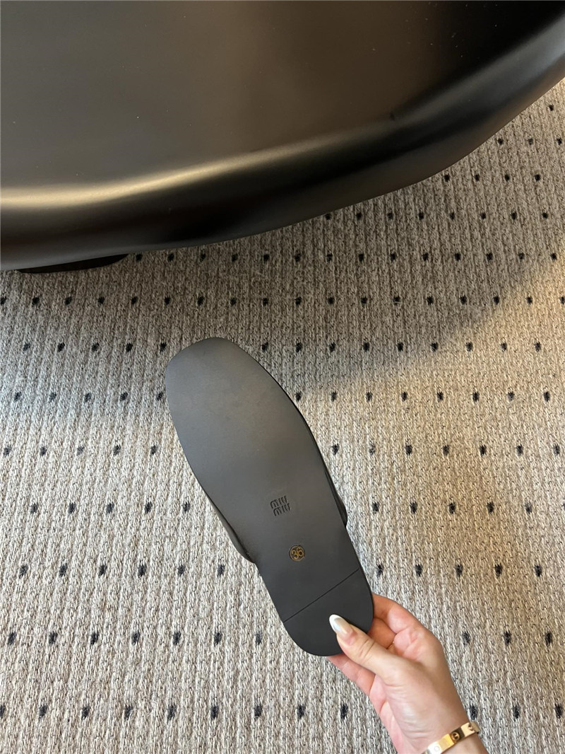 Miu Miu Black Leather Slippers with Embossed Logo
