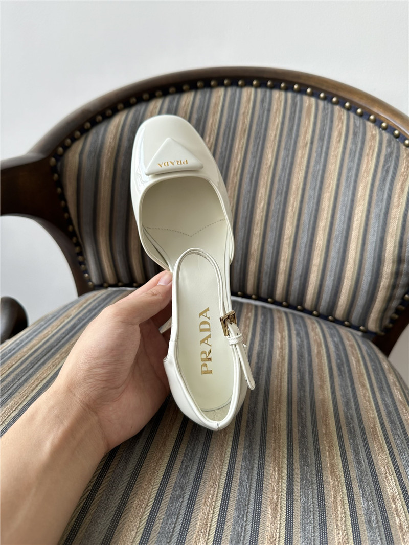 Pra*a white 35mm triangle-logo patent-leather pumps