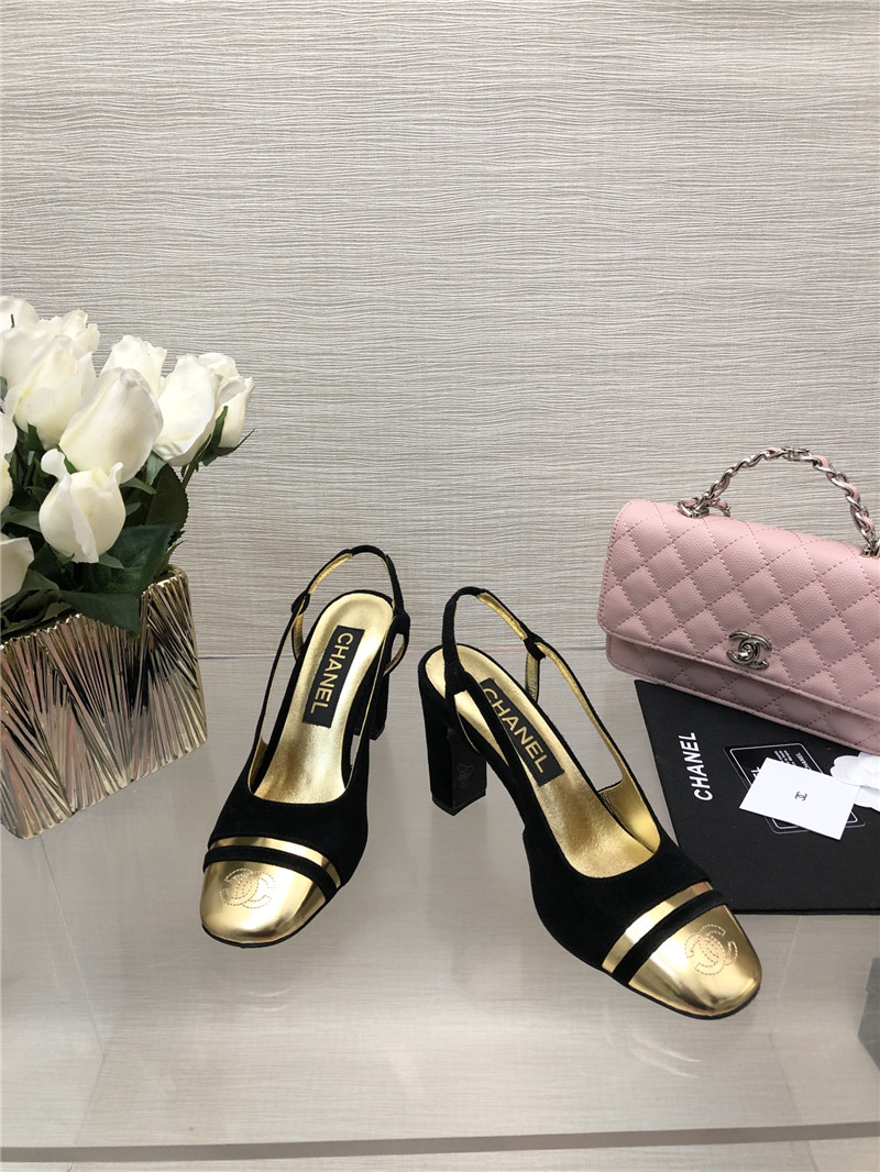 Ch**el black suede and gold leather slingbacks