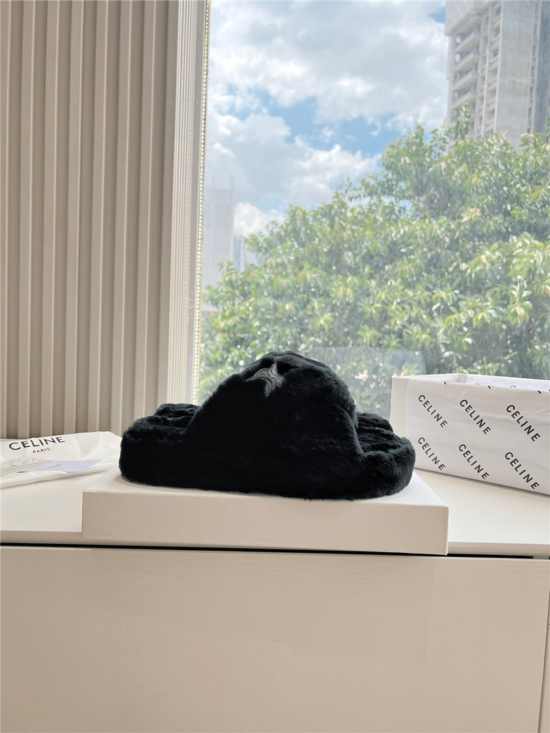Ce1i*e cross fur slides triomphe in black shearling