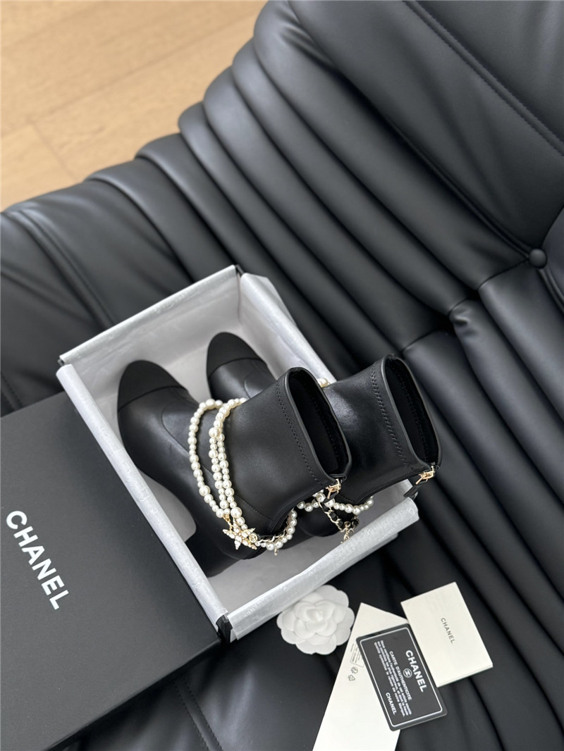 Ch**el black calfskin pearl ankle boots