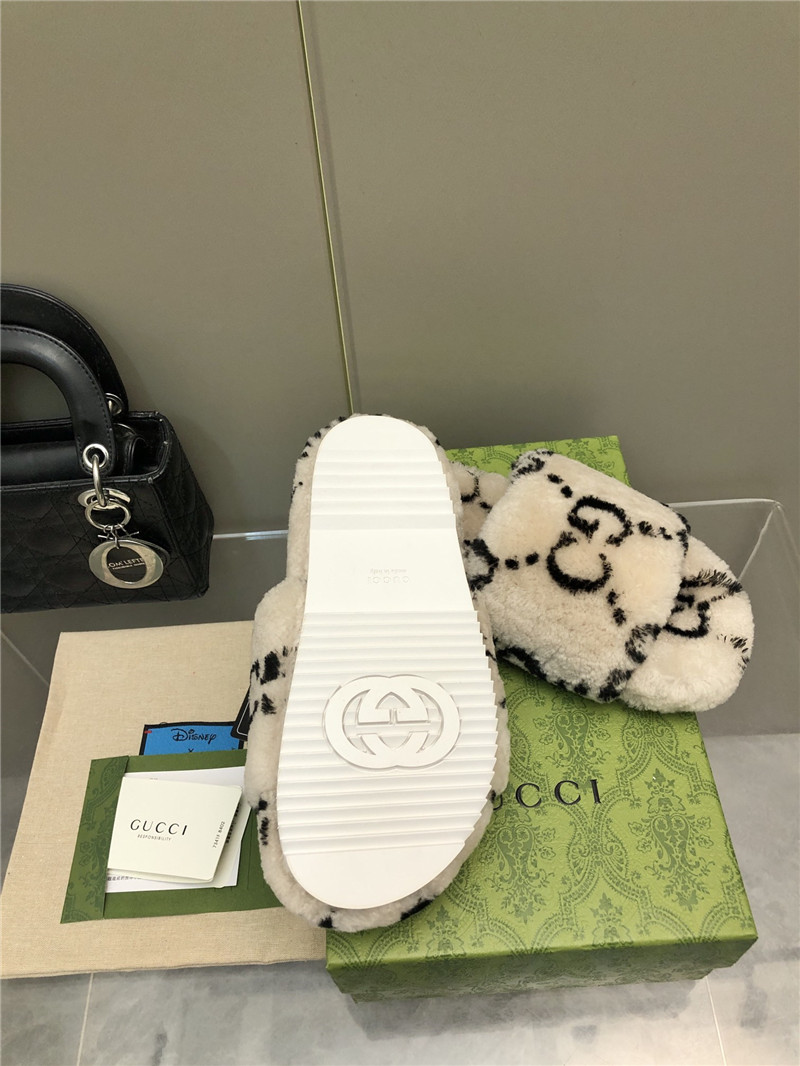 Gvc*1 monogram motif shearling slides natural