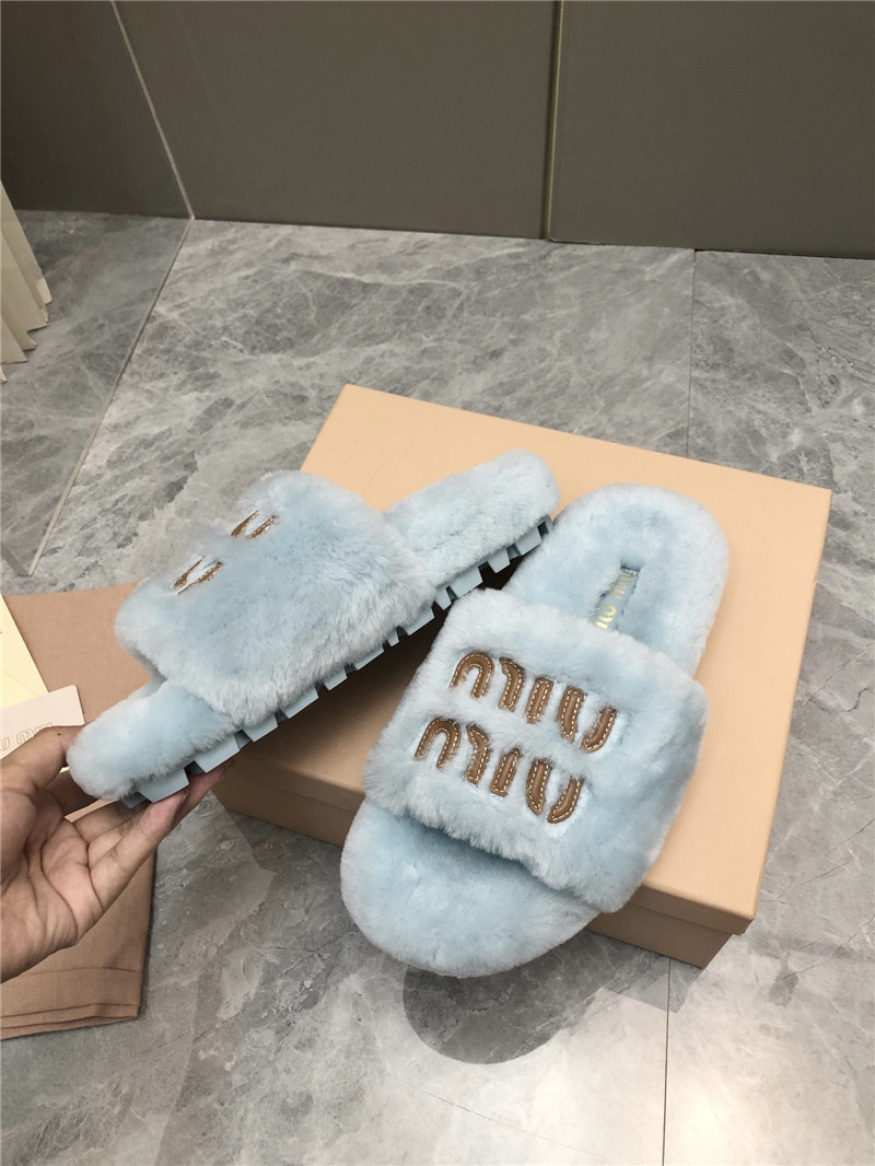 Miu Miu Lettering Logo Shearling Slides Blue