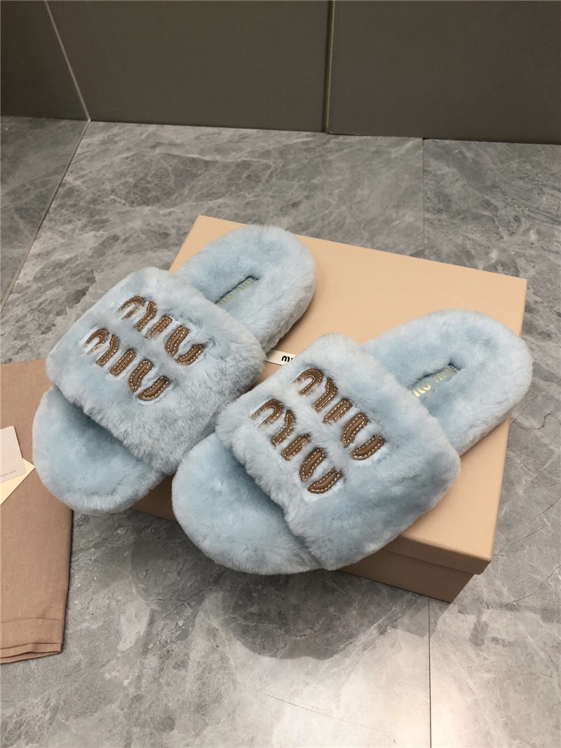 Miu Miu Lettering Logo Shearling Slides Blue