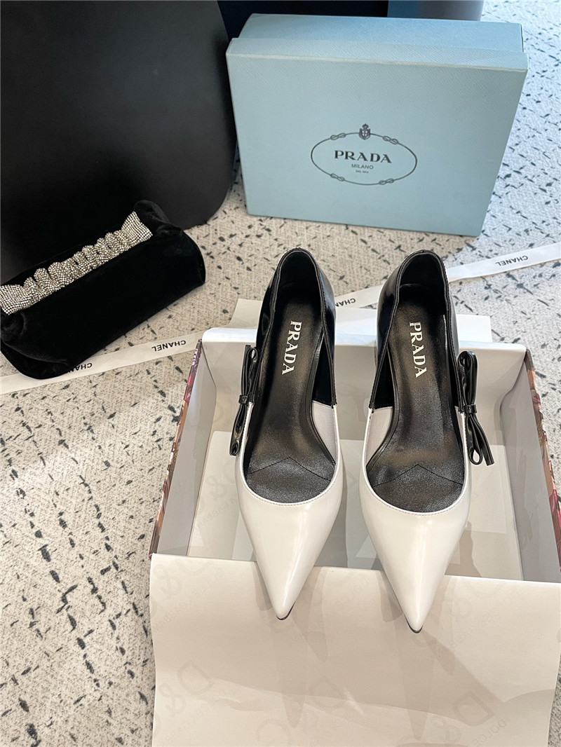 Pra*a bow black/white brushed leather pumps