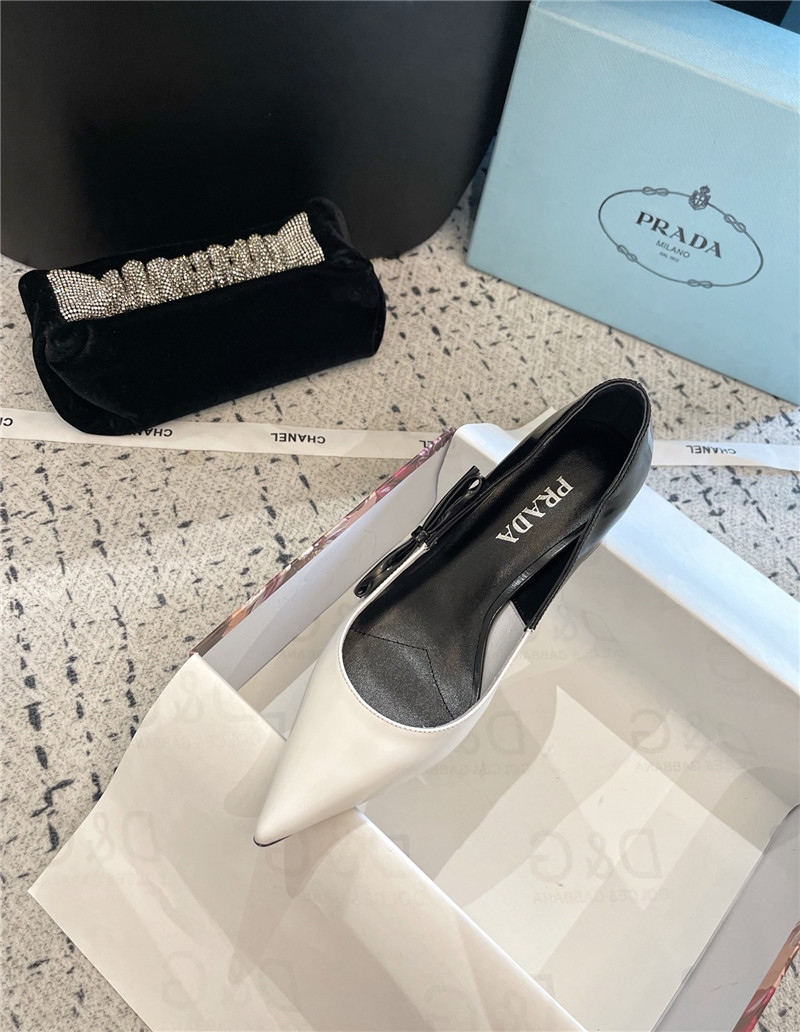 Pra*a bow black/white brushed leather pumps