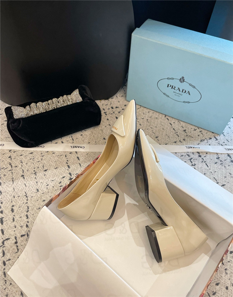 Pra*a triangle logo ivory brushed leather pumps