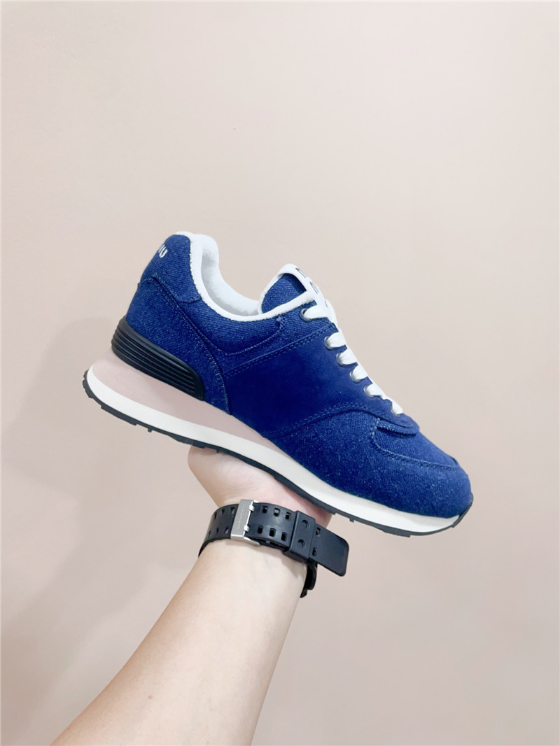 Miu Miu x New Balance 574 Leather Sneakers in Blue
