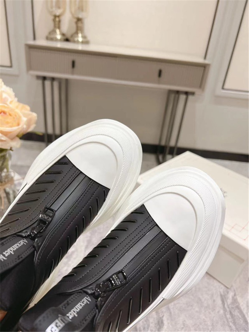 a1exa*der Mcqv*en zip-up low top sneakers