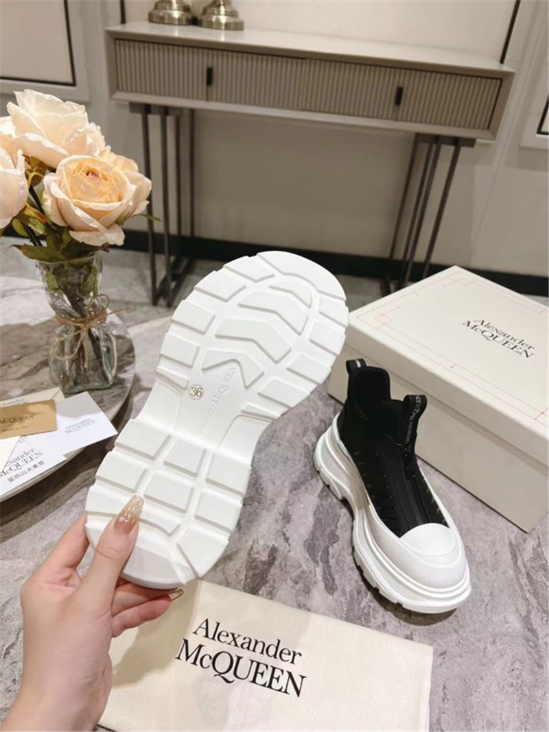 a1exa*der Mcqv*en zip-up low top sneakers