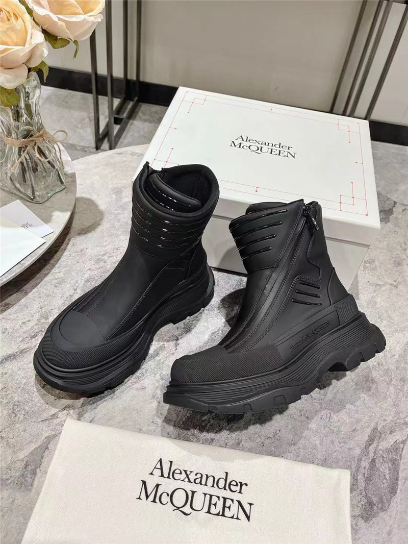 a1exa*der Mcqv*en black tread slick high top sneakers