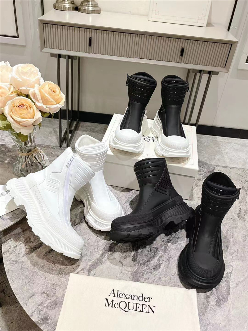 a1exa*der Mcqv*en black tread slick high top sneakers