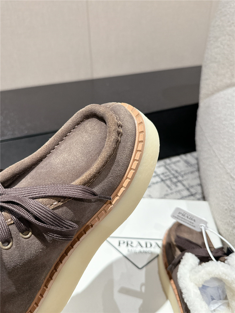 Pra*a brown suede shearling platform ankle boots