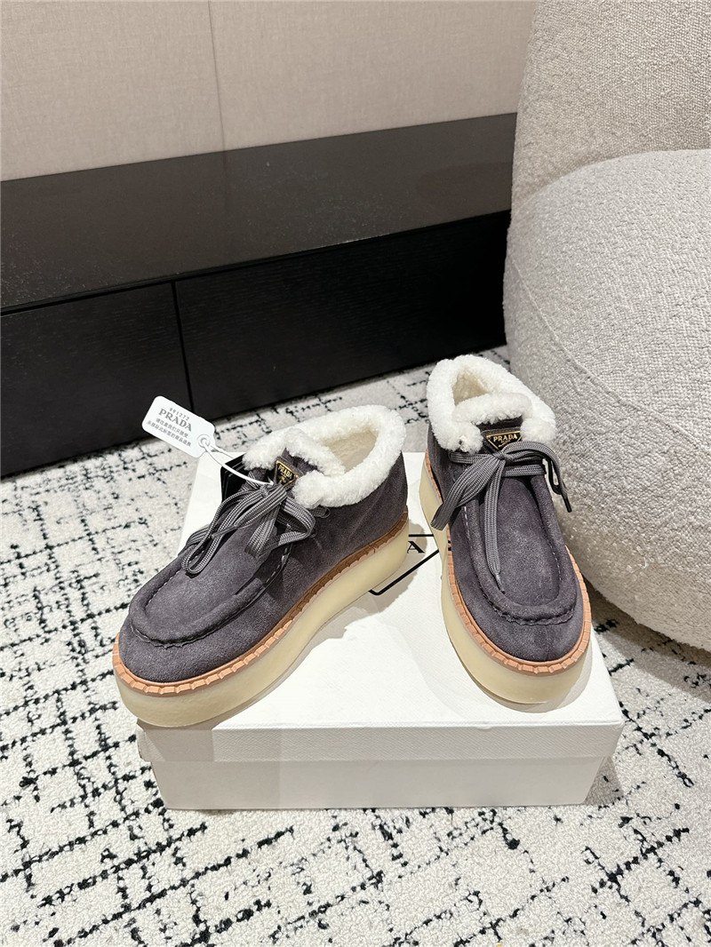 Pra*a gray suede shearling platform ankle boots