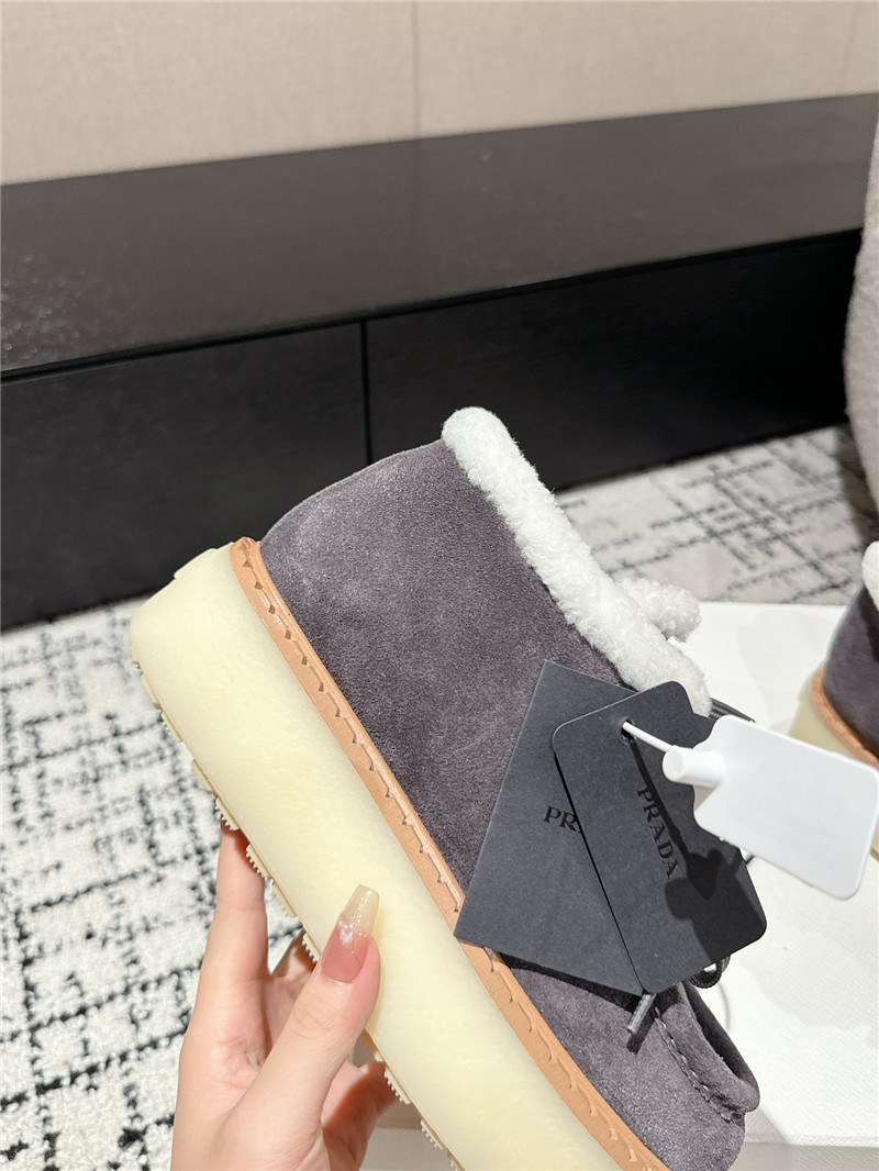 Pra*a gray suede shearling platform ankle boots