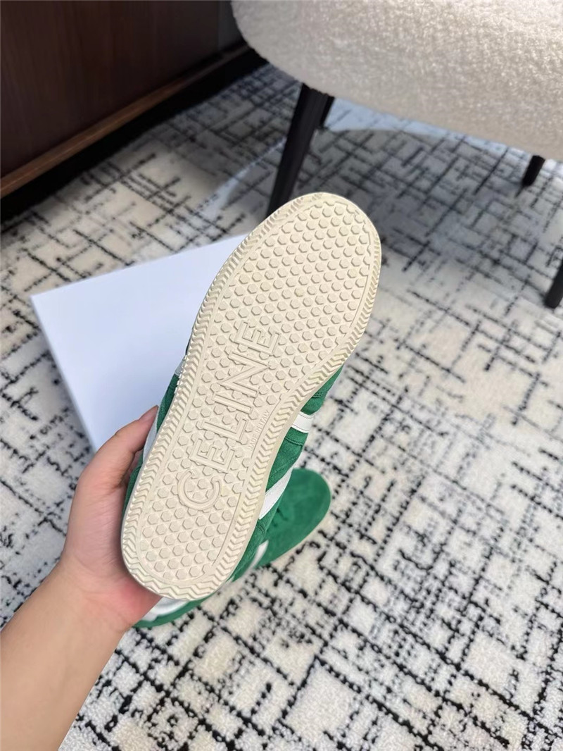 Ce1i*e green suede sneakers