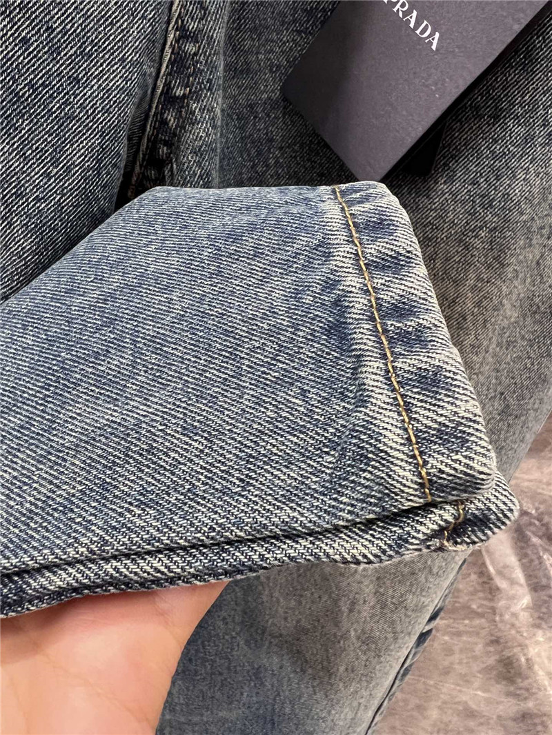 Pra*a triangle logo denim trousers