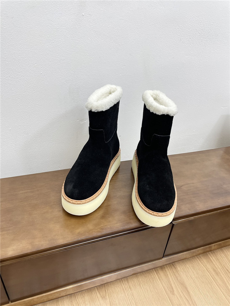 Pra*a triangle-logo platform black suede boots