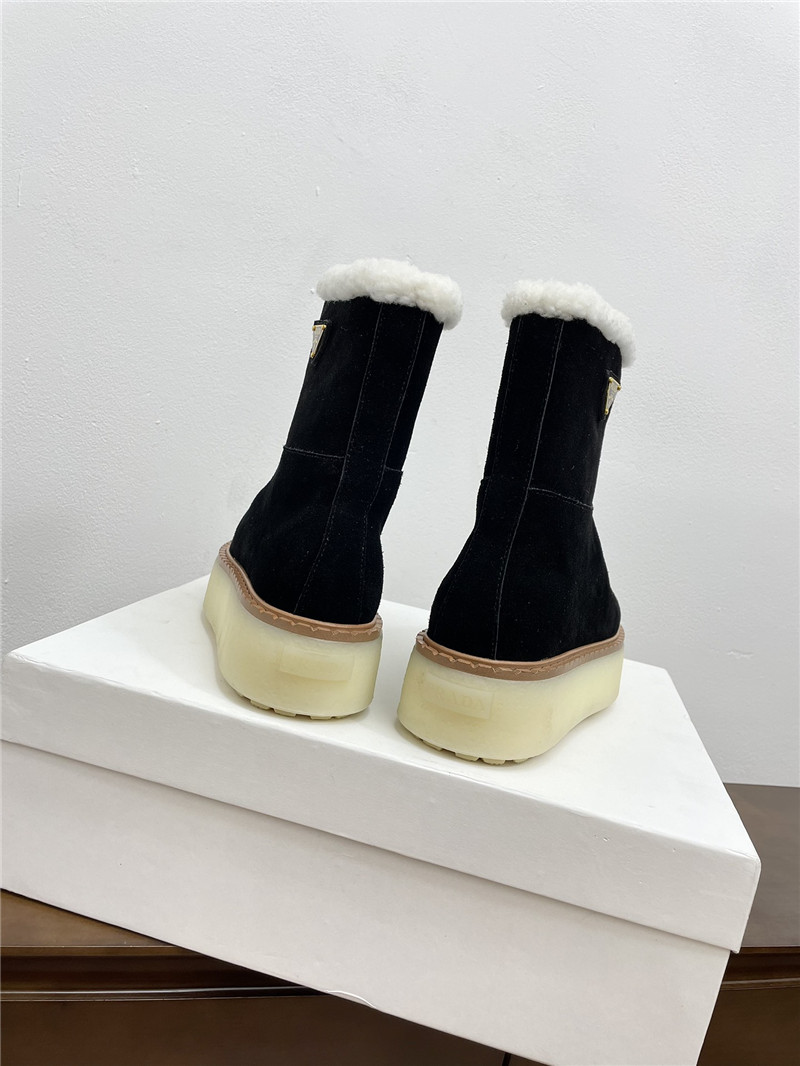 Pra*a triangle-logo platform black suede boots