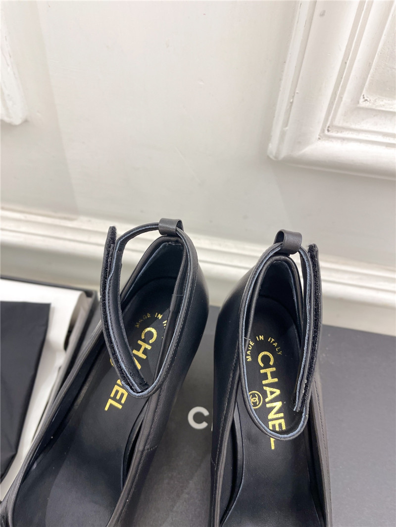 Ch**el bow mary jane heel pumps in black calfskin
