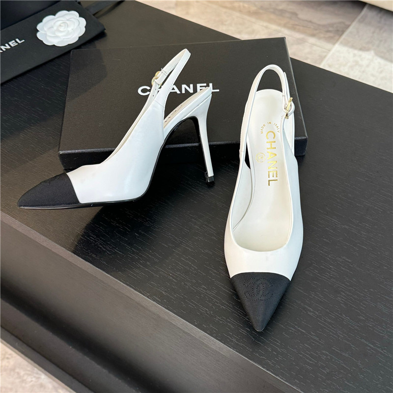 Ch**el pointed heel slingbacks in ivory/black calfskin