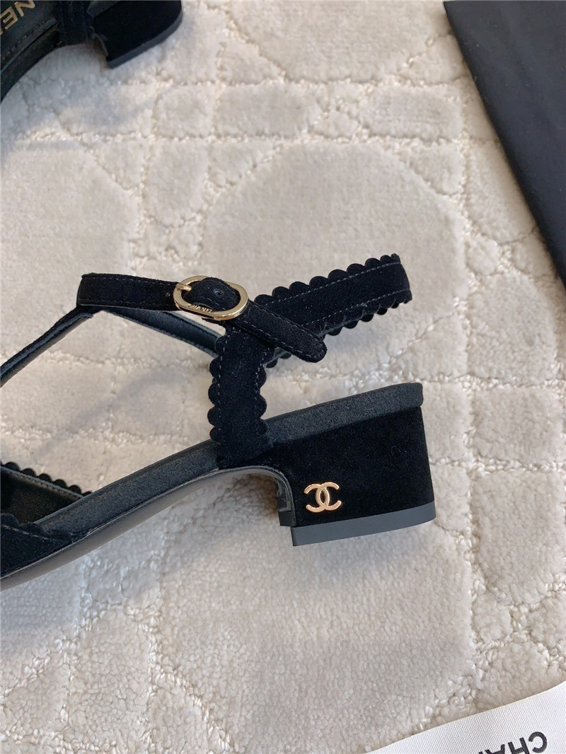 Ch**el camellia slingback flats in black suede leather