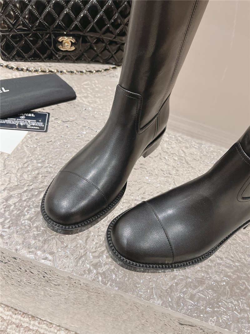 Ch**el black calfskin rider ankle boots
