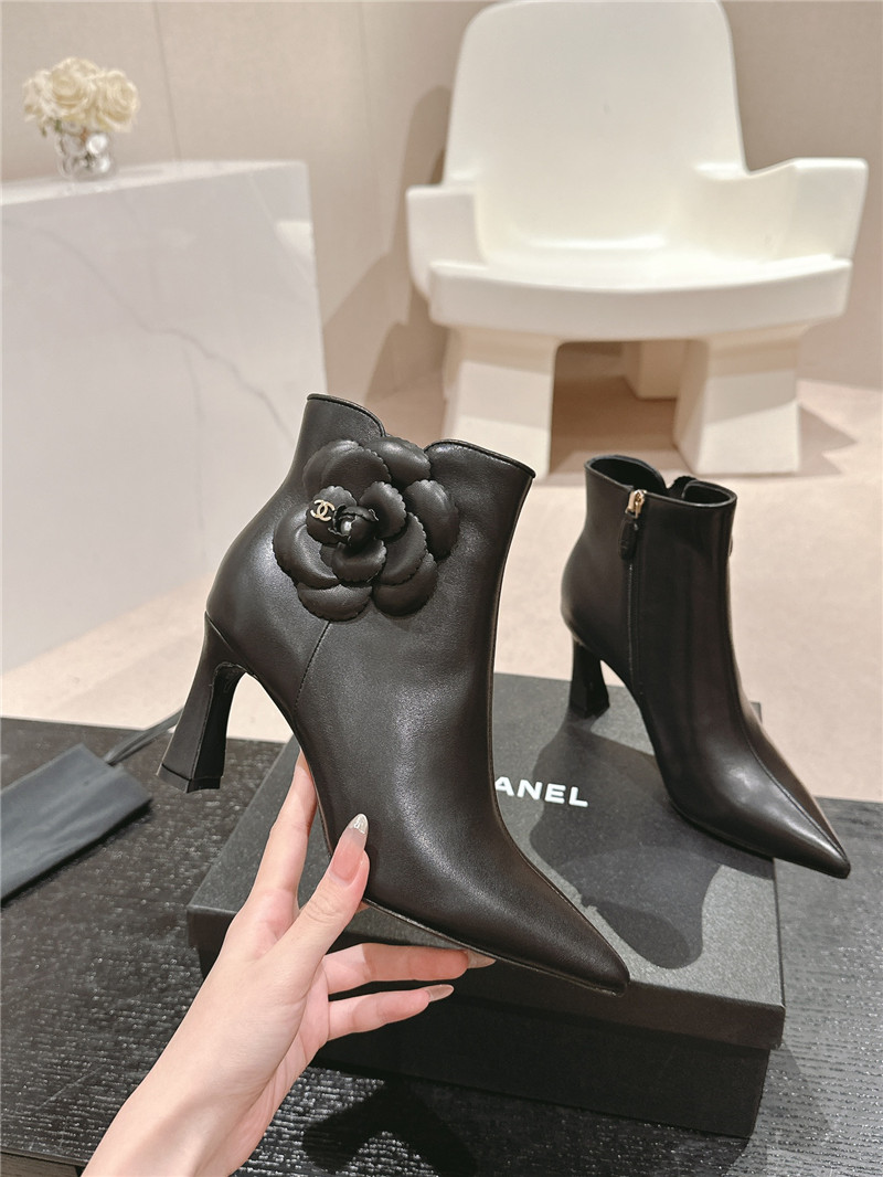 Ch**el heel black calfskin pointed toe boots