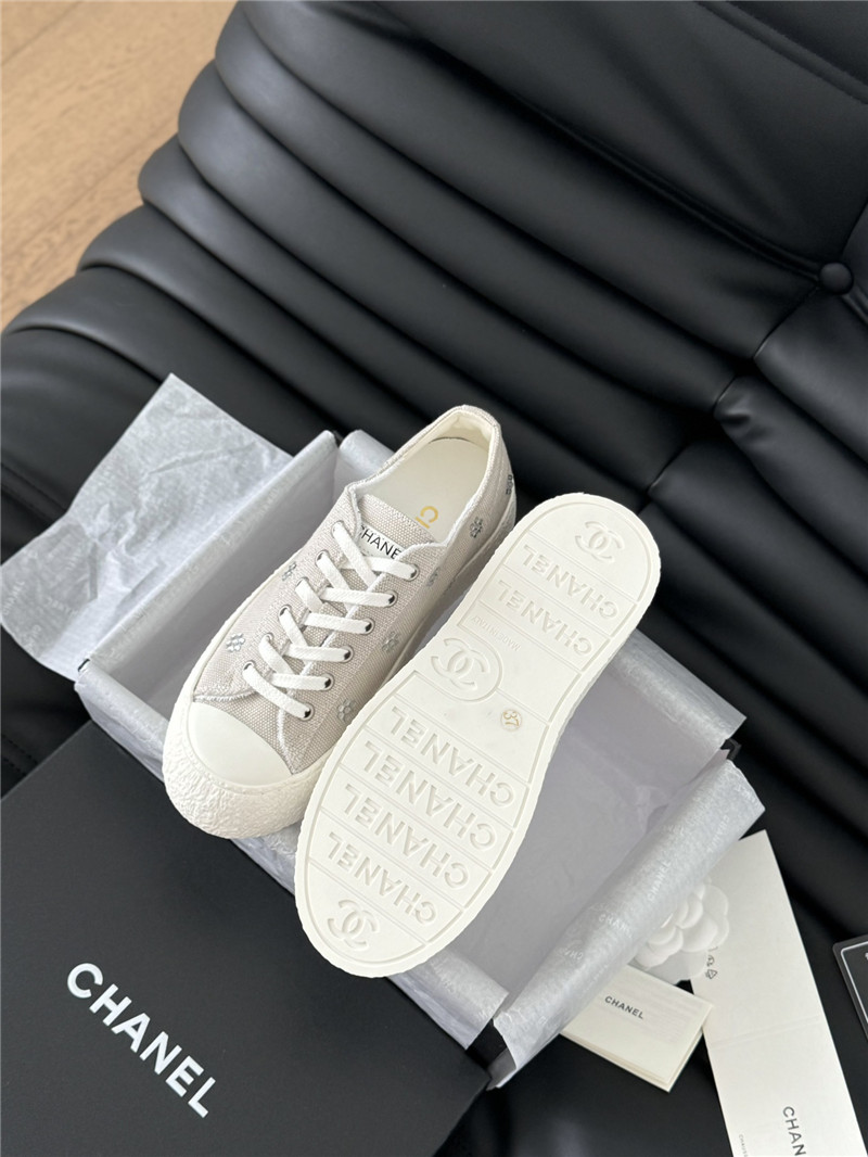 Ch**el beige lace-up low top canvas sneakers