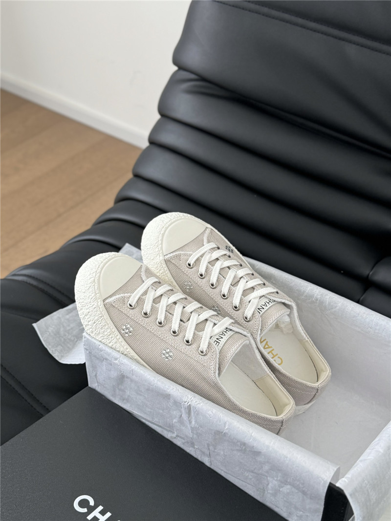 Ch**el beige lace-up low top canvas sneakers