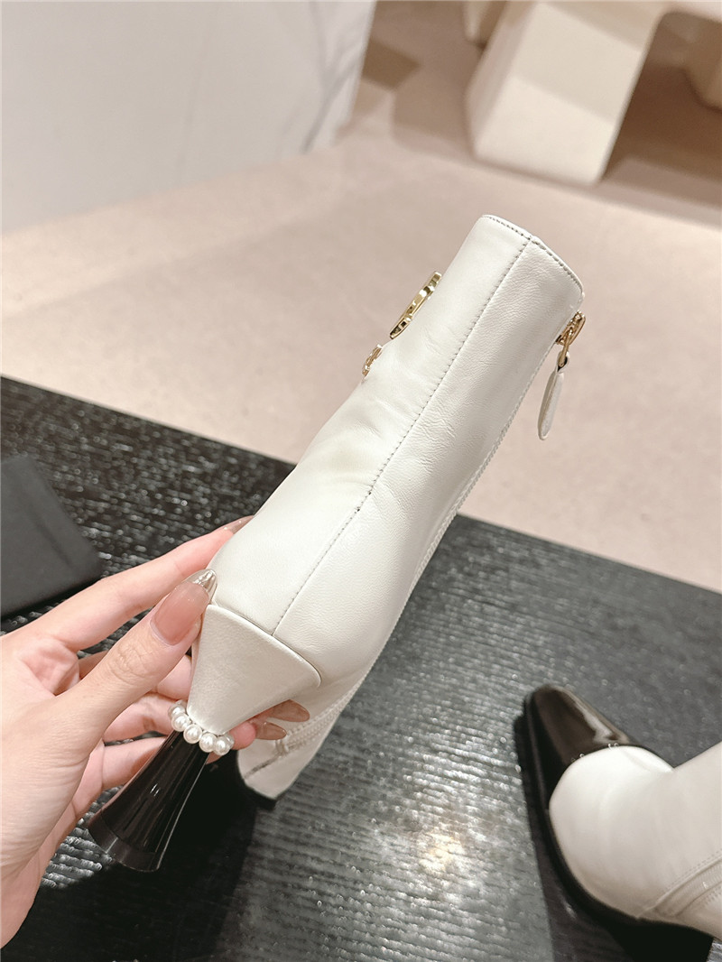 Ch**el white patent leather boots
