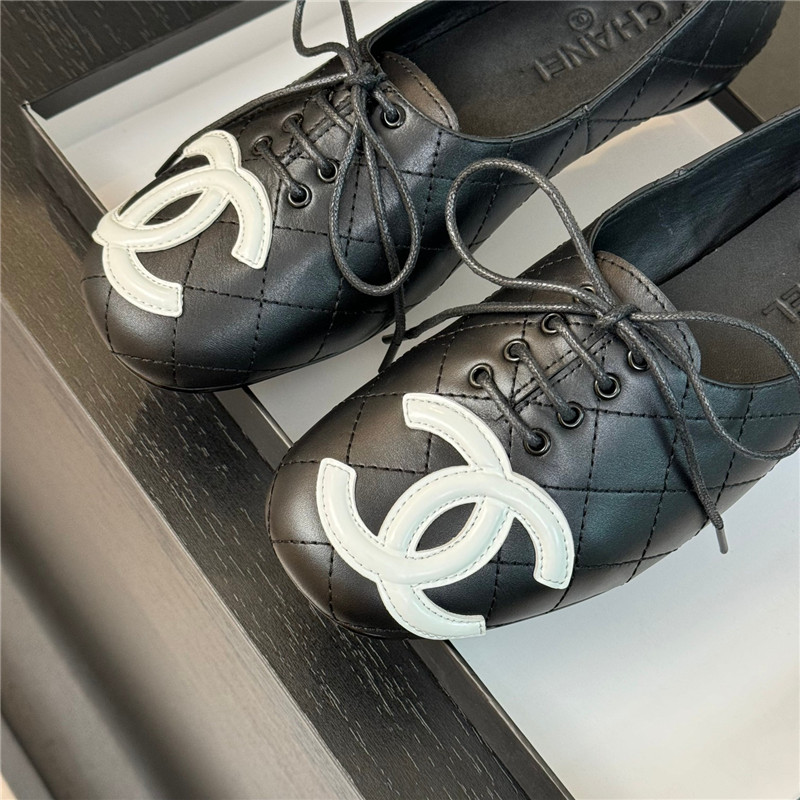 Ch**el lace-up black leather flats