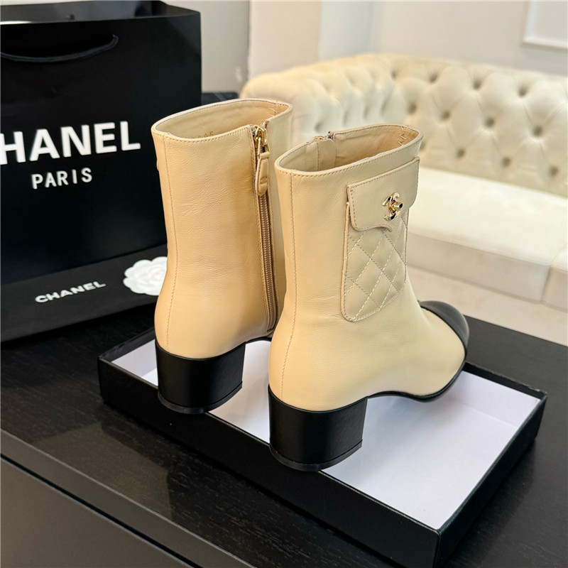 Ch**el brown calfskin cap toe ankle boots