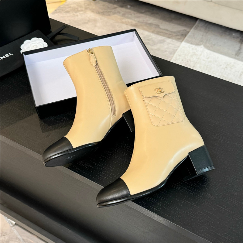 Ch**el brown calfskin cap toe ankle boots