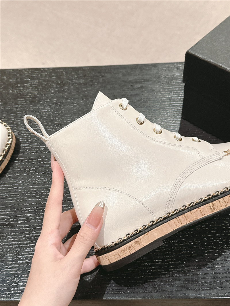 Ch**el lace-up calfskin flat ankle boots in white