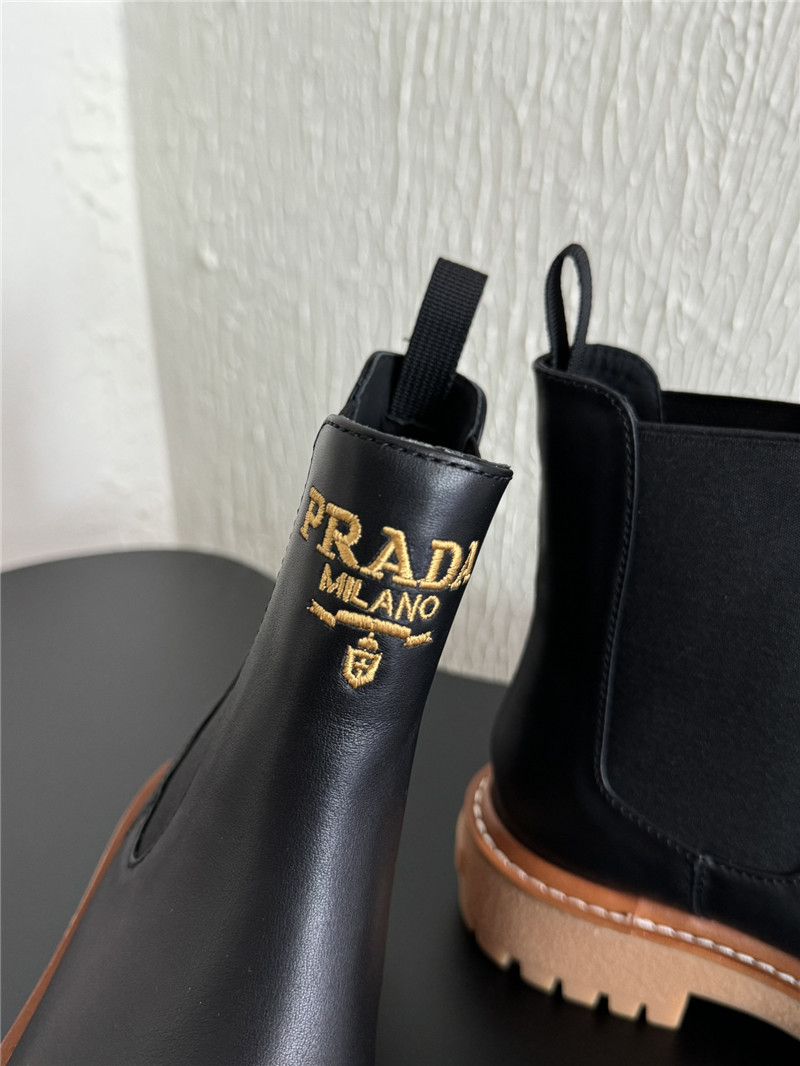 Pra*a embroidered logo chelsea boots