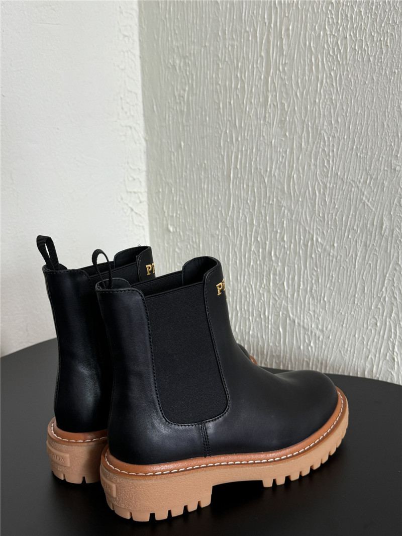 Pra*a embroidered logo chelsea boots