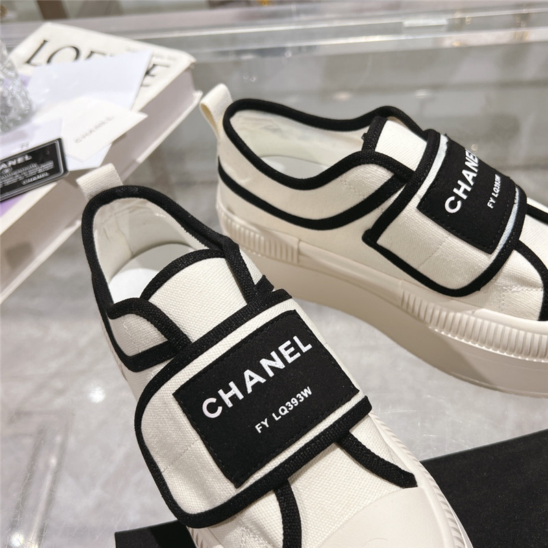 Ch**el white canvas velcro sneakers